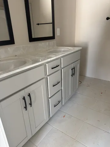a utility room with cabinets