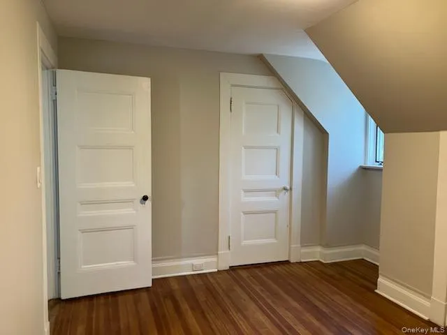 a living room with a fireplace and a fireplace