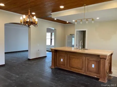 a spacious bathroom with a double vanity sink and a mirror