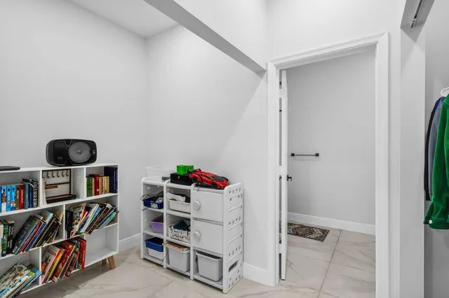 a bathroom with a shower and a toilet