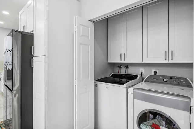 a house view with swimming pool