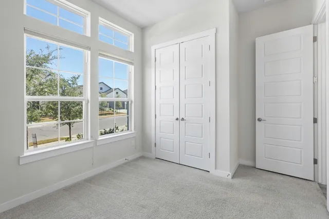 an empty room with windows