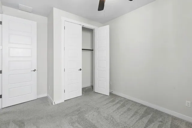 an empty room with closet