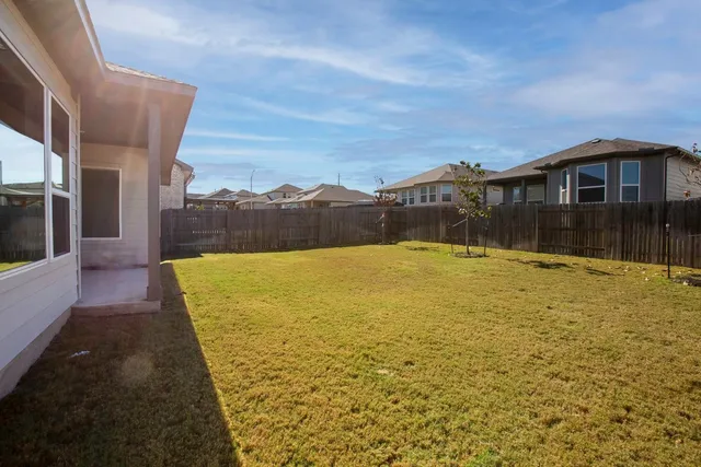 a view of swimming pool with patio