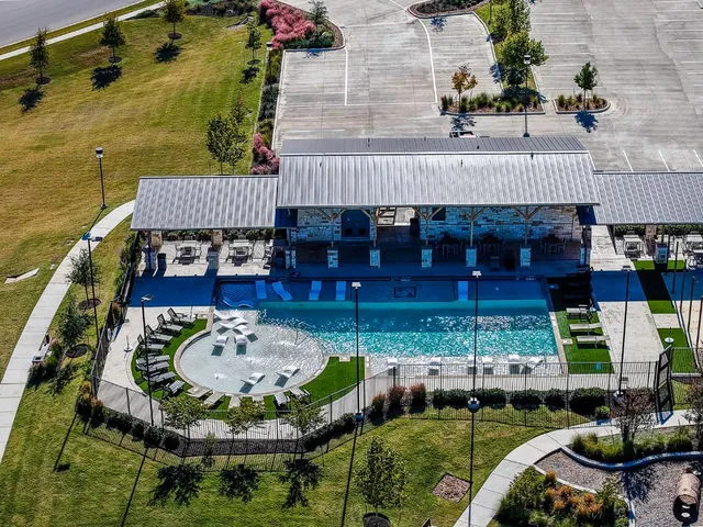 a view of a swimming pool with an ocean view