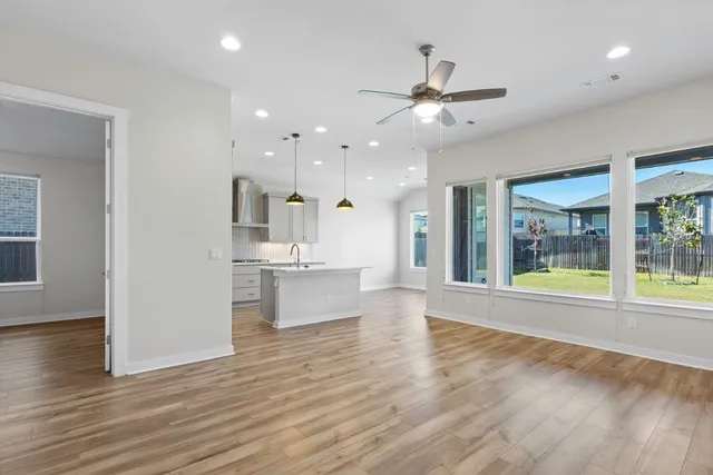 a view of kitchen and windows