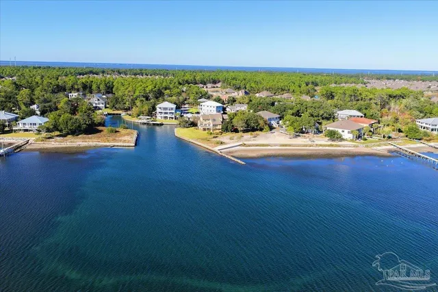an aerial view of a house with a garden