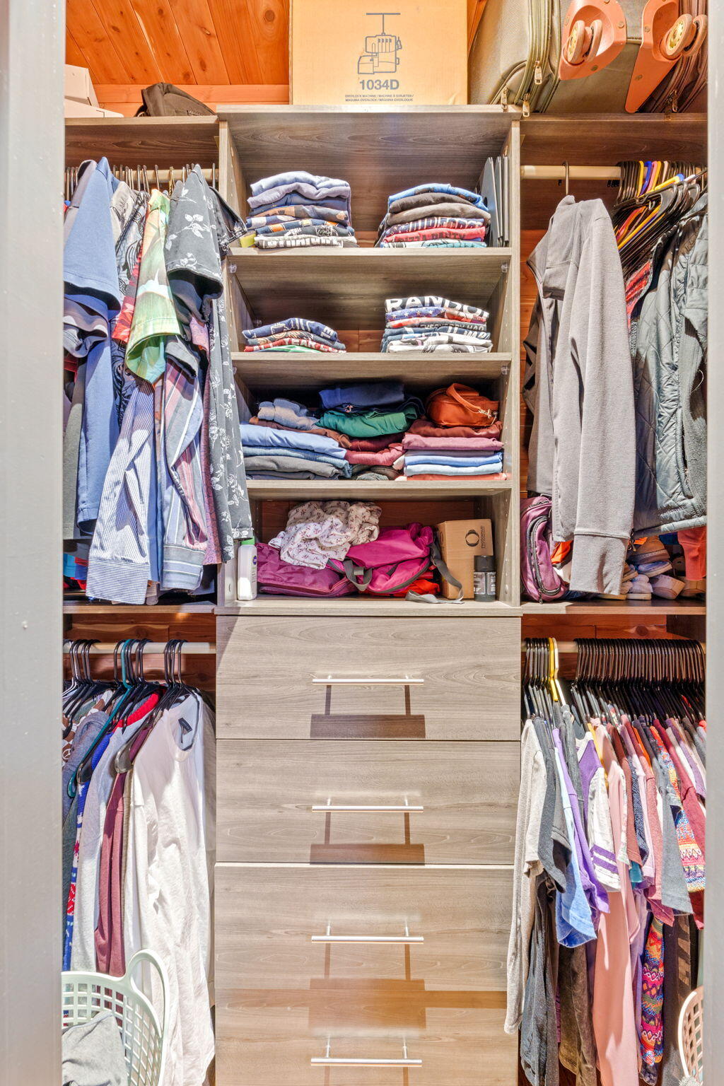 236 West 24th Street Riviera Beach, FL 33404 - Photo 16 of 48 a view of walk in closet with clothes and shoes