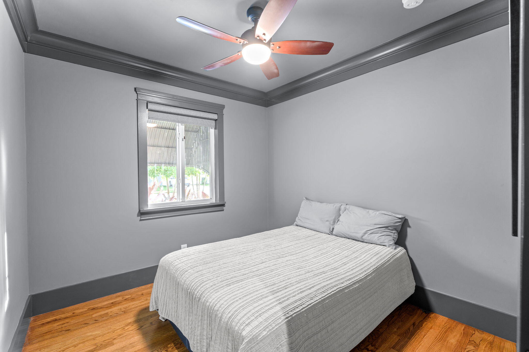 236 West 24th Street Riviera Beach, FL 33404 - Photo 18 of 48 a bedroom with bed and a window