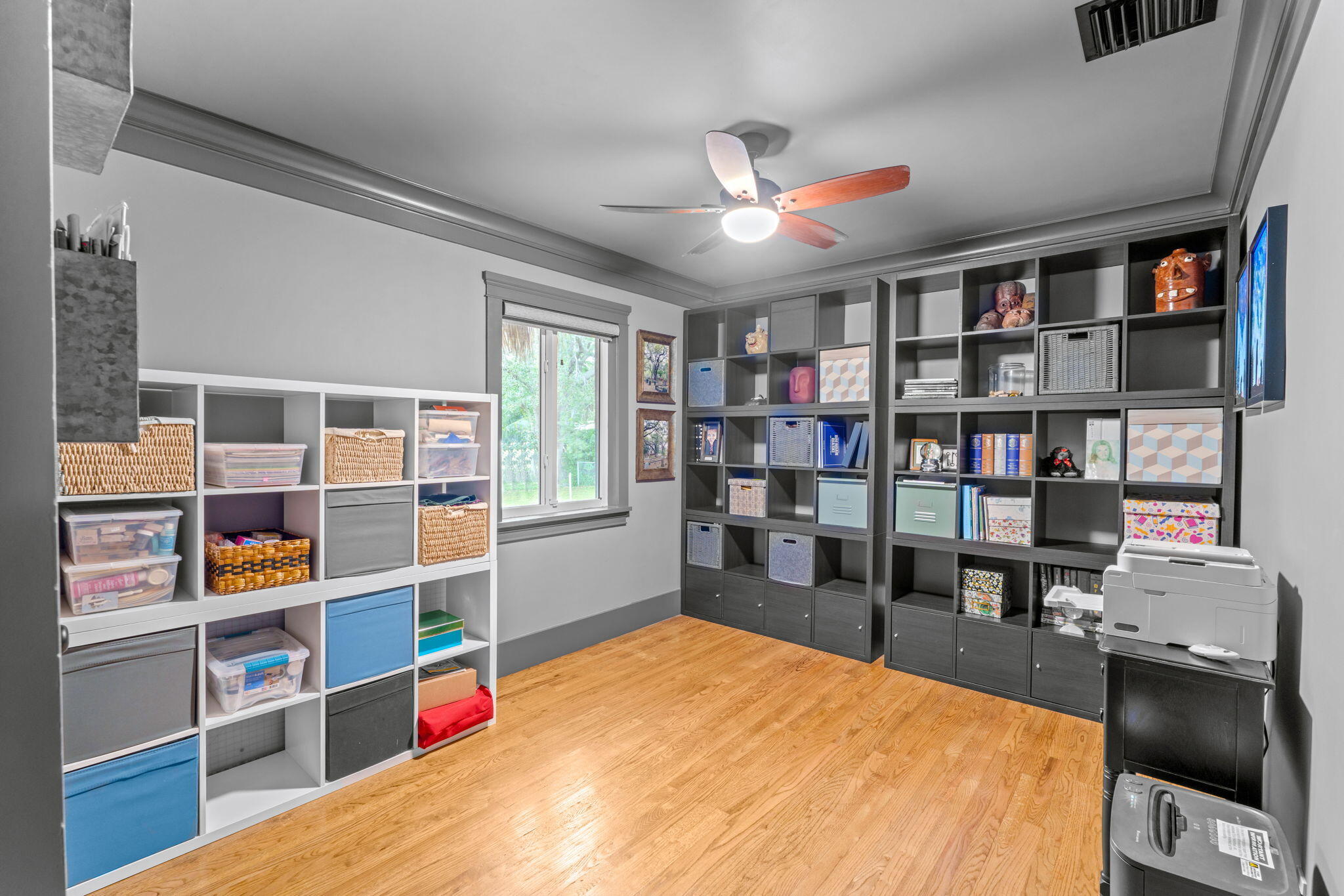 236 West 24th Street Riviera Beach, FL 33404 - Photo 20 of 48 a room with furniture and a book shelf