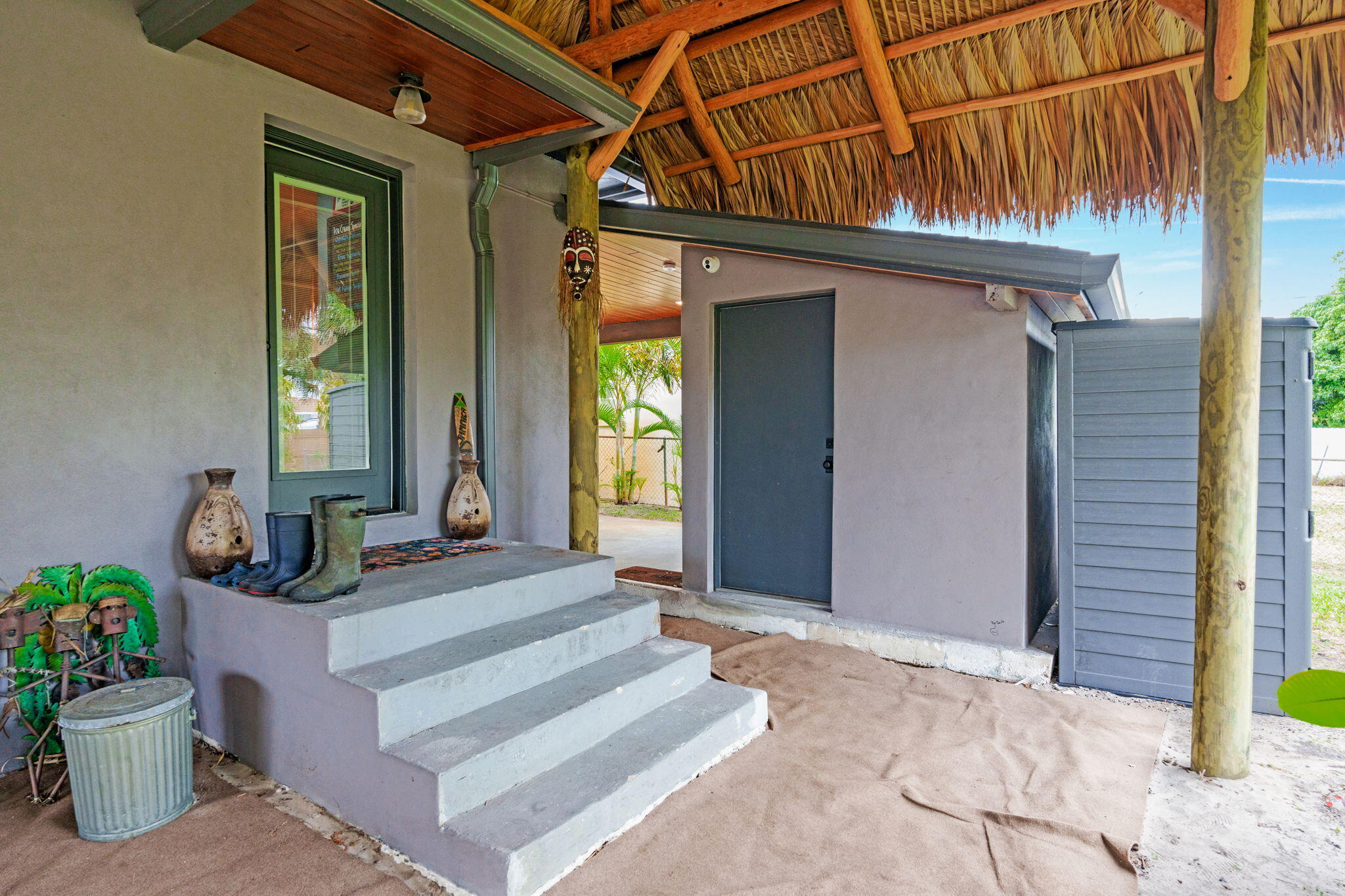 236 West 24th Street Riviera Beach, FL 33404 - Photo 25 of 48 a front view of a house with potted plants