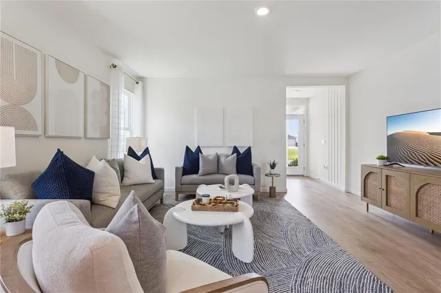 a living room with furniture and a couch