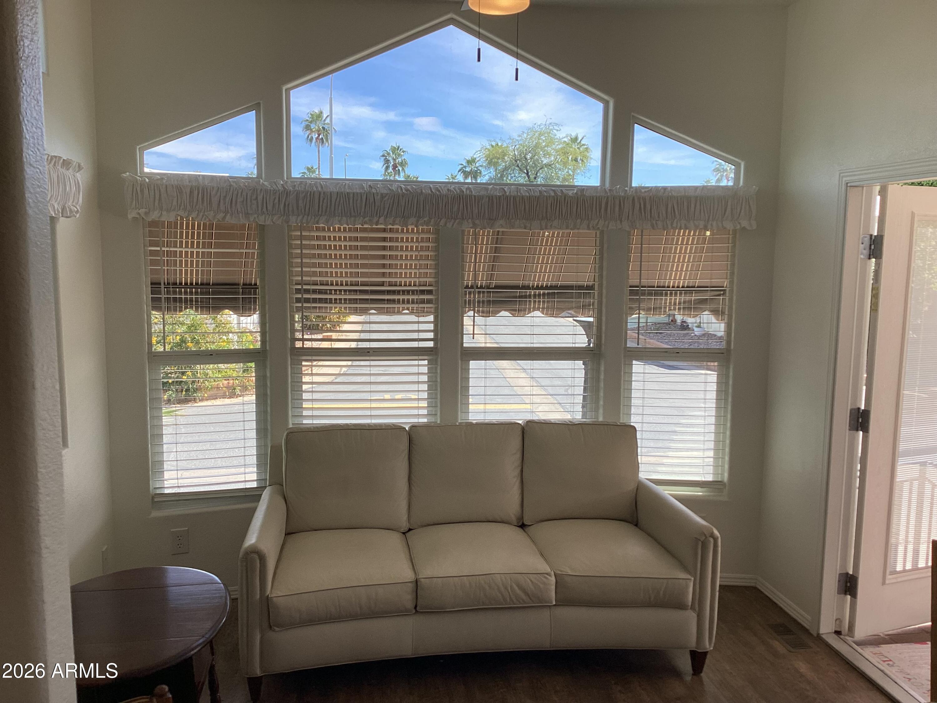 111 South Greenfield Road, Unit 163 Mesa, AZ 85206 - Photo 5 of 16 a living room with furniture and a window