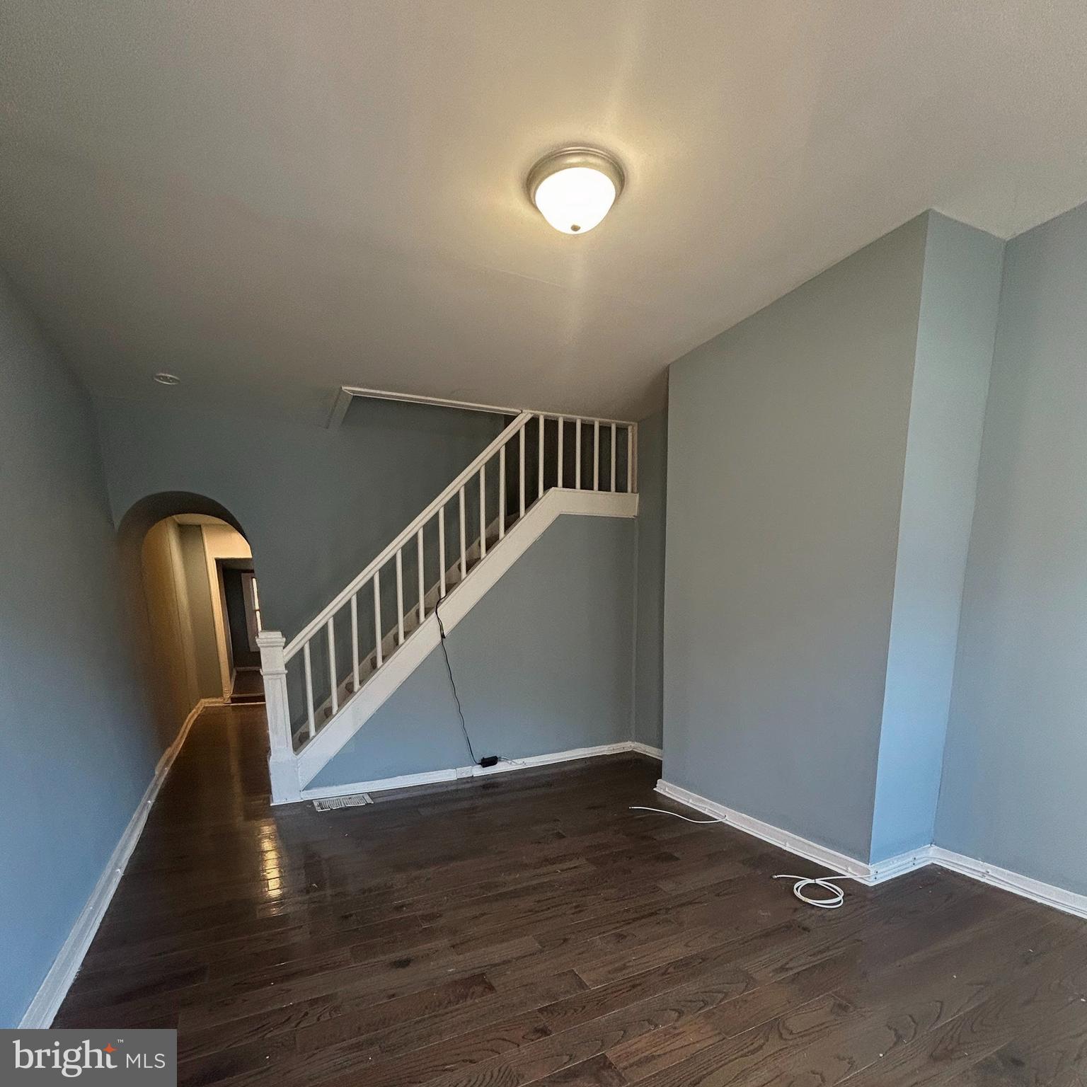 337 South Mount Street Baltimore, MD 21223 - Photo 4 of 16 a view of entryway with wooden floor