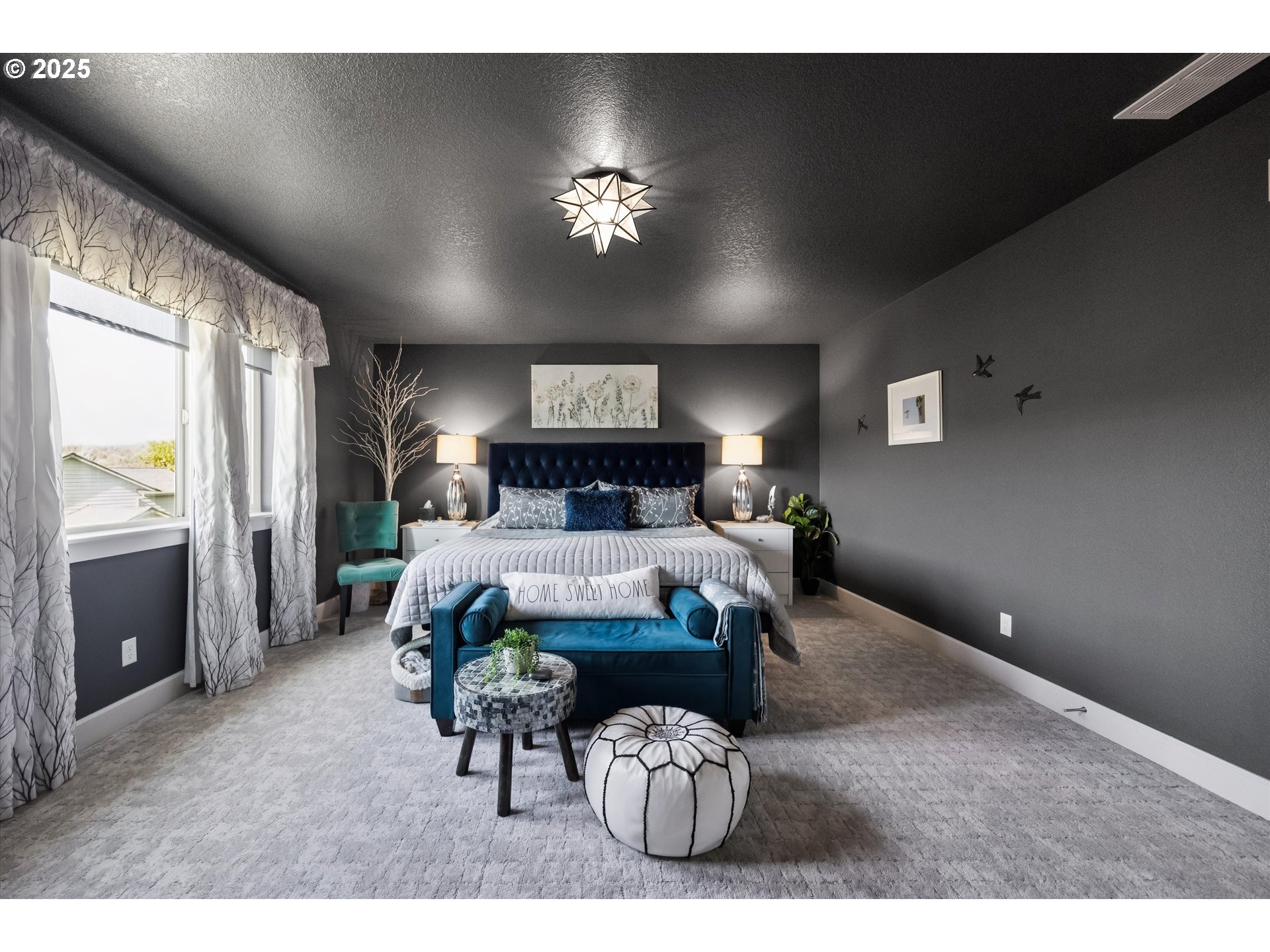 2440 Heather Way Forest Grove, OR 97116 - Photo 11 of 24 a bedroom with furniture and a chandelier