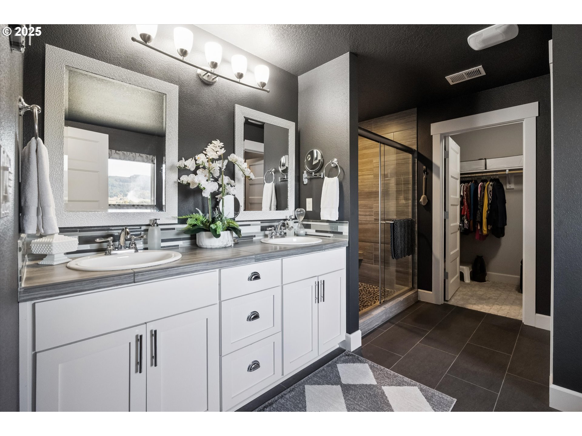 2440 Heather Way Forest Grove, OR 97116 - Photo 12 of 24 a bathroom with a double vanity sink and a mirror