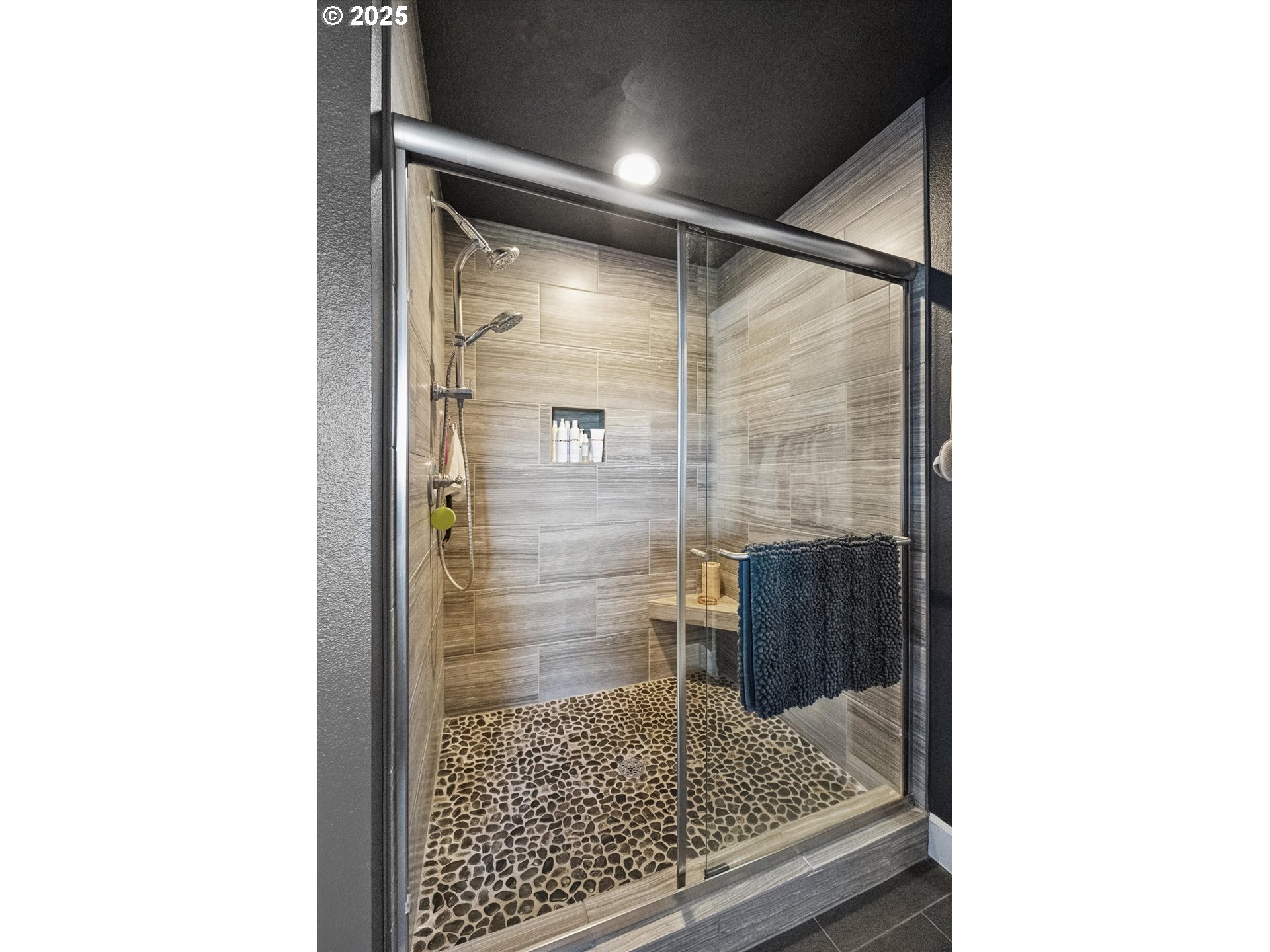 2440 Heather Way Forest Grove, OR 97116 - Photo 14 of 24 a bathroom with a shower and a glass door