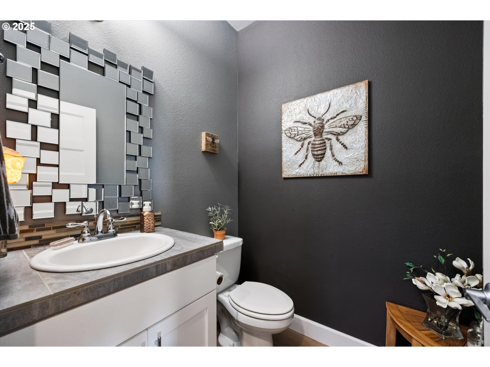 2440 Heather Way Forest Grove, OR 97116 - Photo 20 of 24 a bathroom with a sink a toilet and mirror