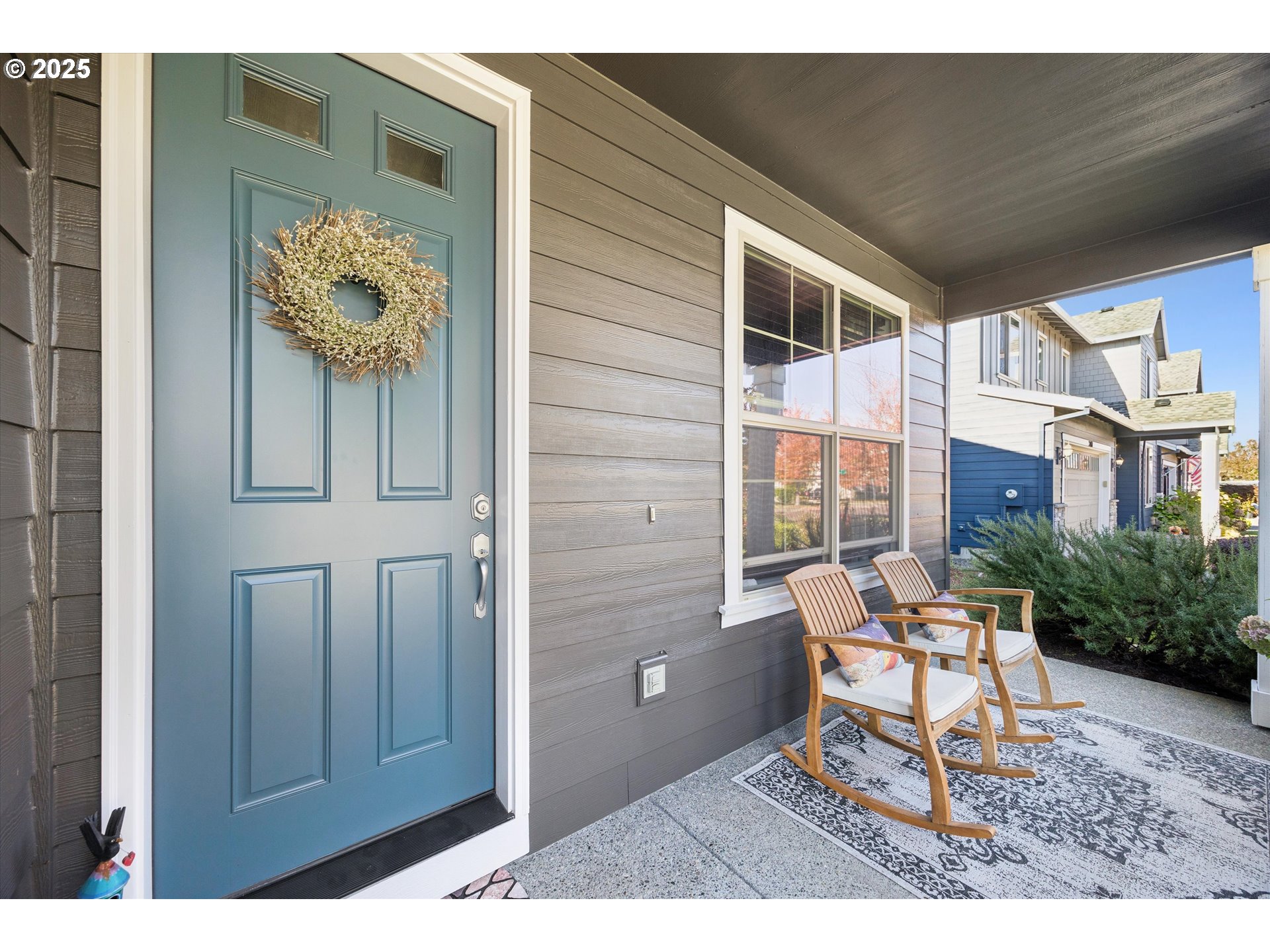 2440 Heather Way Forest Grove, OR 97116 - Photo 2 of 24 a balcony with table and chairs