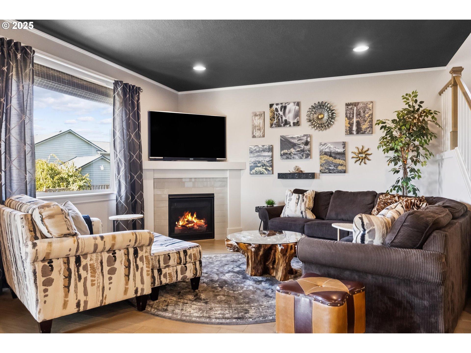 2440 Heather Way Forest Grove, OR 97116 - Photo 3 of 24 a living room with furniture and a flat screen tv