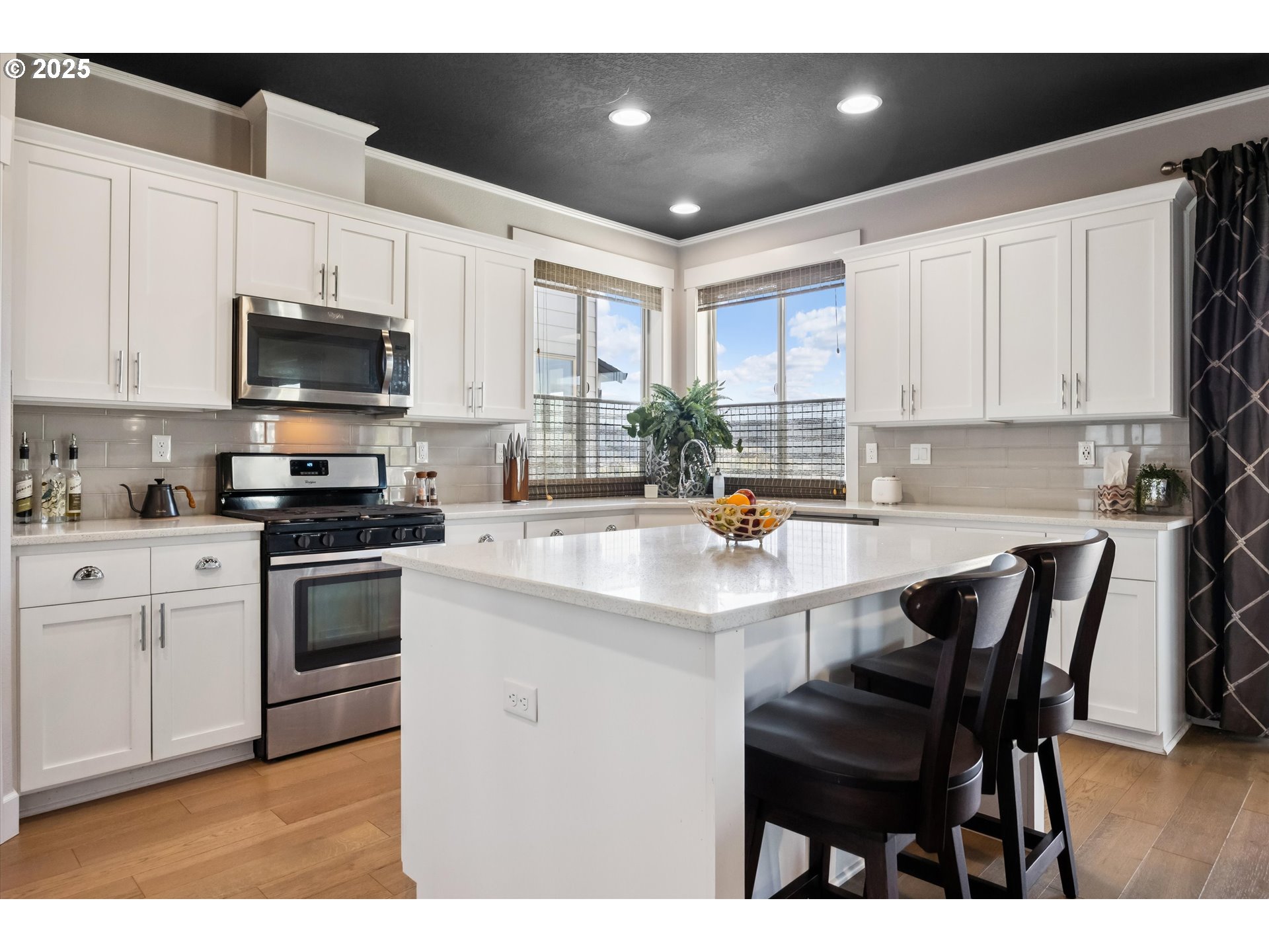 2440 Heather Way Forest Grove, OR 97116 - Photo 7 of 24 a kitchen with a sink cabinets and window