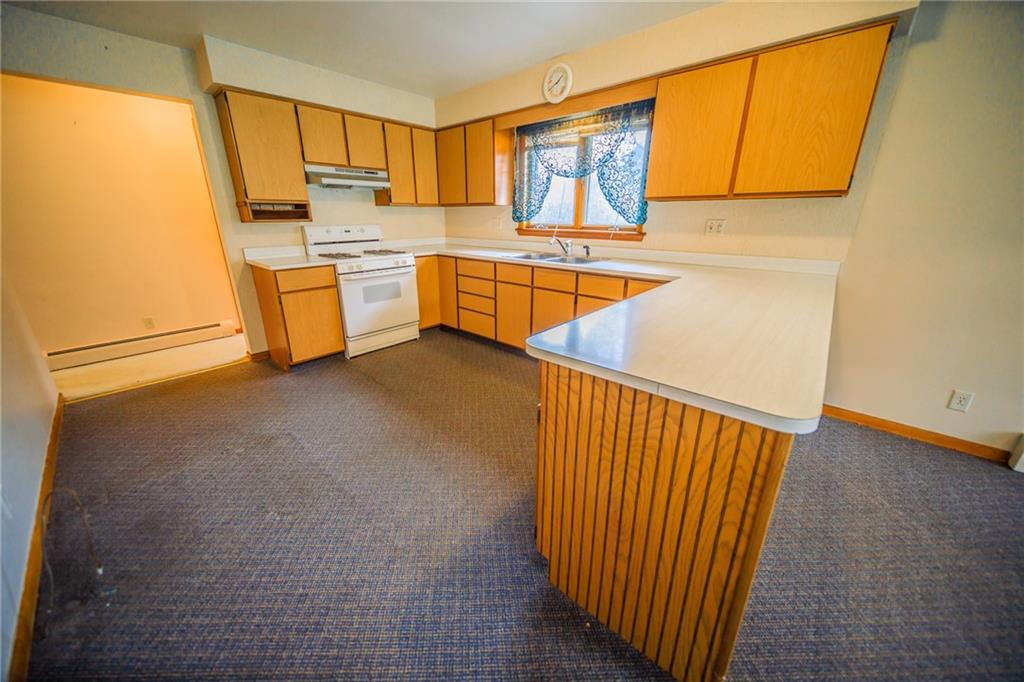 786 Wheatland Road West Middlesex, PA 16159 - Photo 6 of 24 Kitchen is open to the dining area with counter top peninsula for extra dining space or for that occasional quick breakfast, lunch or dinner