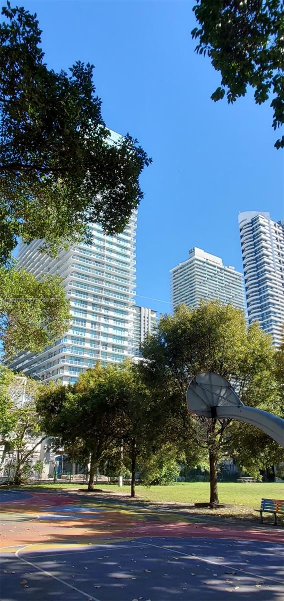 79 Southwest 12th Street, Unit 2411S Miami, FL 33130 - Photo 23 of 23 a view of a pathway both side of building