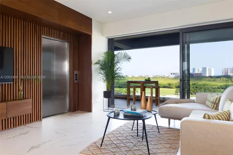 a balcony with furniture and view of balcony