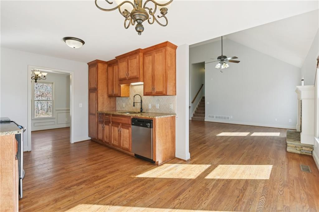102 Oak Ridge Trail White, GA 30184 - Photo 12 of 31 a kitchen with stainless steel appliances a stove top oven and cabinets