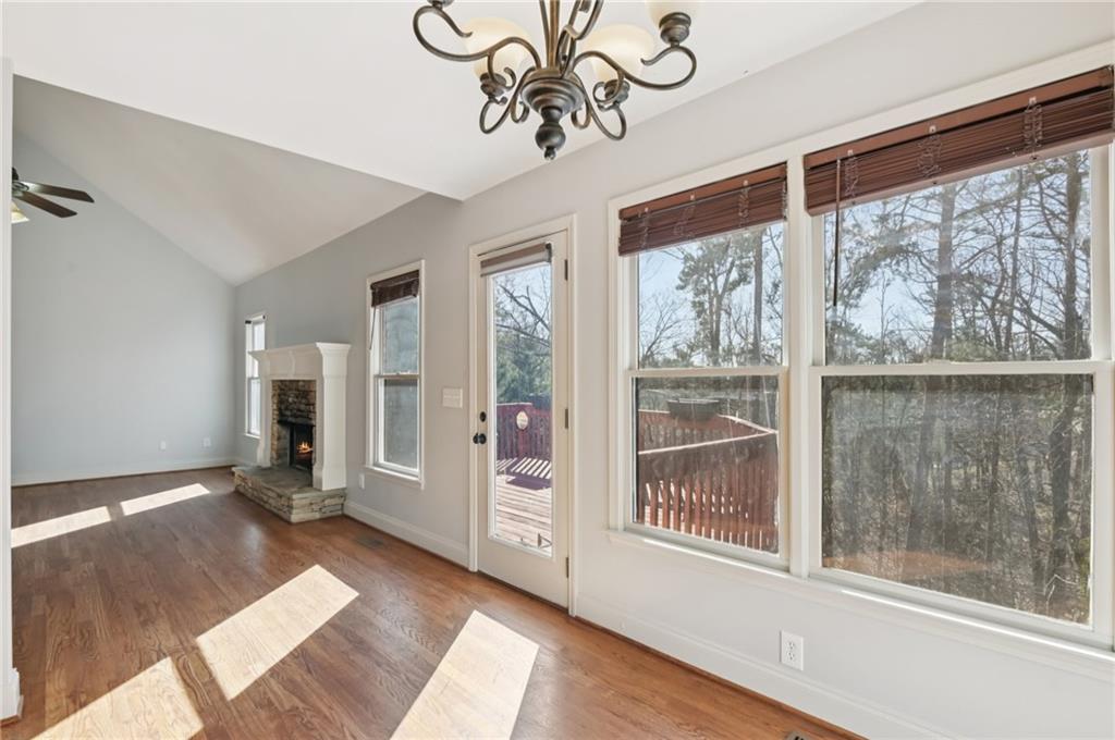 102 Oak Ridge Trail White, GA 30184 - Photo 13 of 31 a view of a room with wooden floor and windows