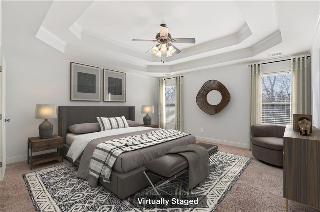 102 Oak Ridge Trail White, GA 30184 - Photo 14 of 31 a bedroom with a bed bathtub and a window