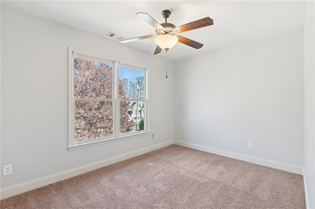 102 Oak Ridge Trail White, GA 30184 - Photo 20 of 31 an empty room with a window