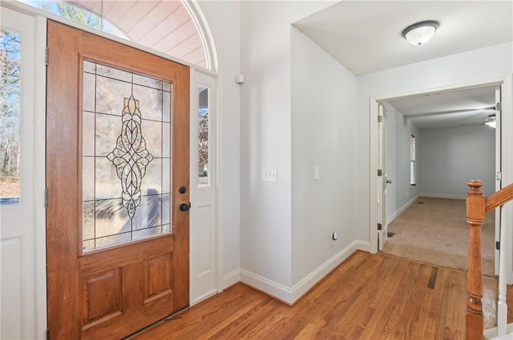 102 Oak Ridge Trail White, GA 30184 - Photo 22 of 31 wooden floor in an empty room