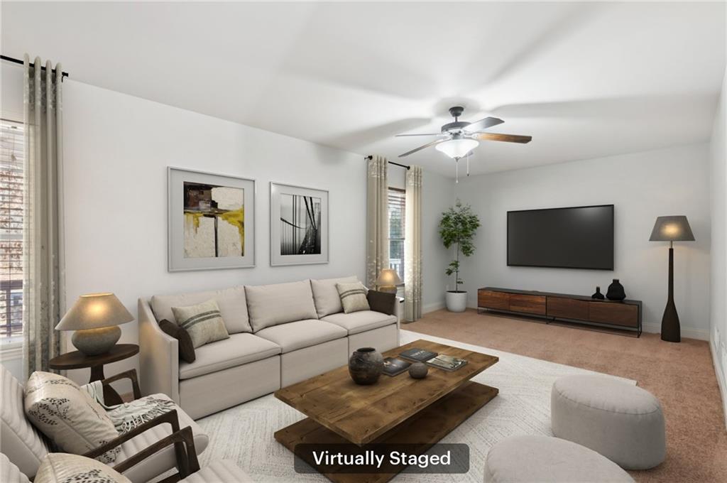 102 Oak Ridge Trail White, GA 30184 - Photo 24 of 31 a living room with furniture and a flat screen tv