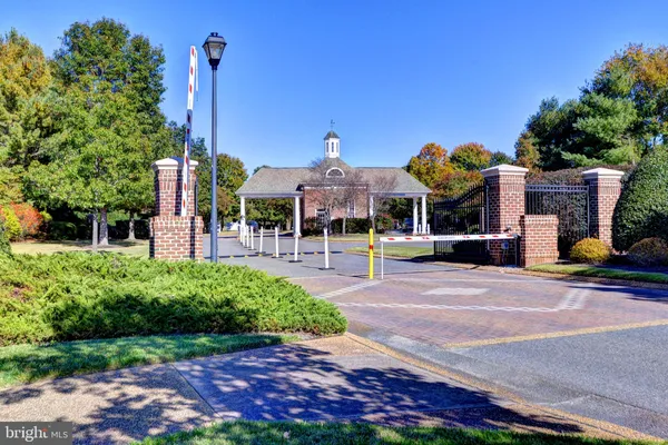 a front view of a building with garden