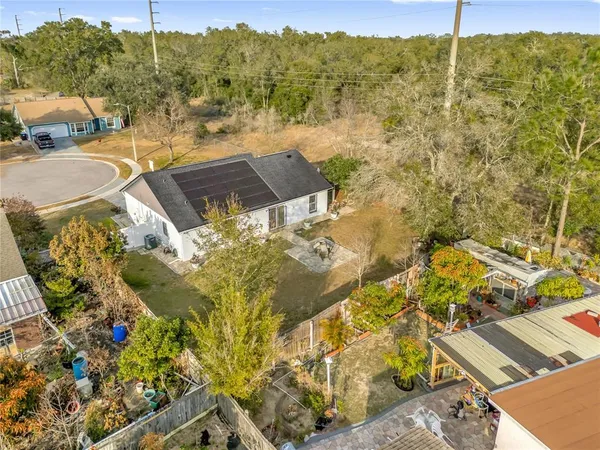 a view of a swimming pool with a yard