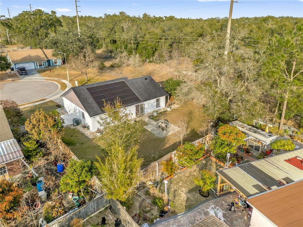 7702 Legacy Lane Orlando, FL 32818 - Photo 21 of 21 a view of a swimming pool with a yard
