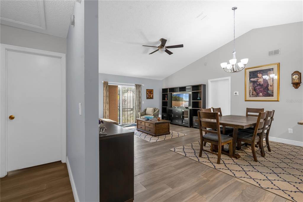 7702 Legacy Lane Orlando, FL 32818 - Photo 9 of 21 a view of a dining room with furniture