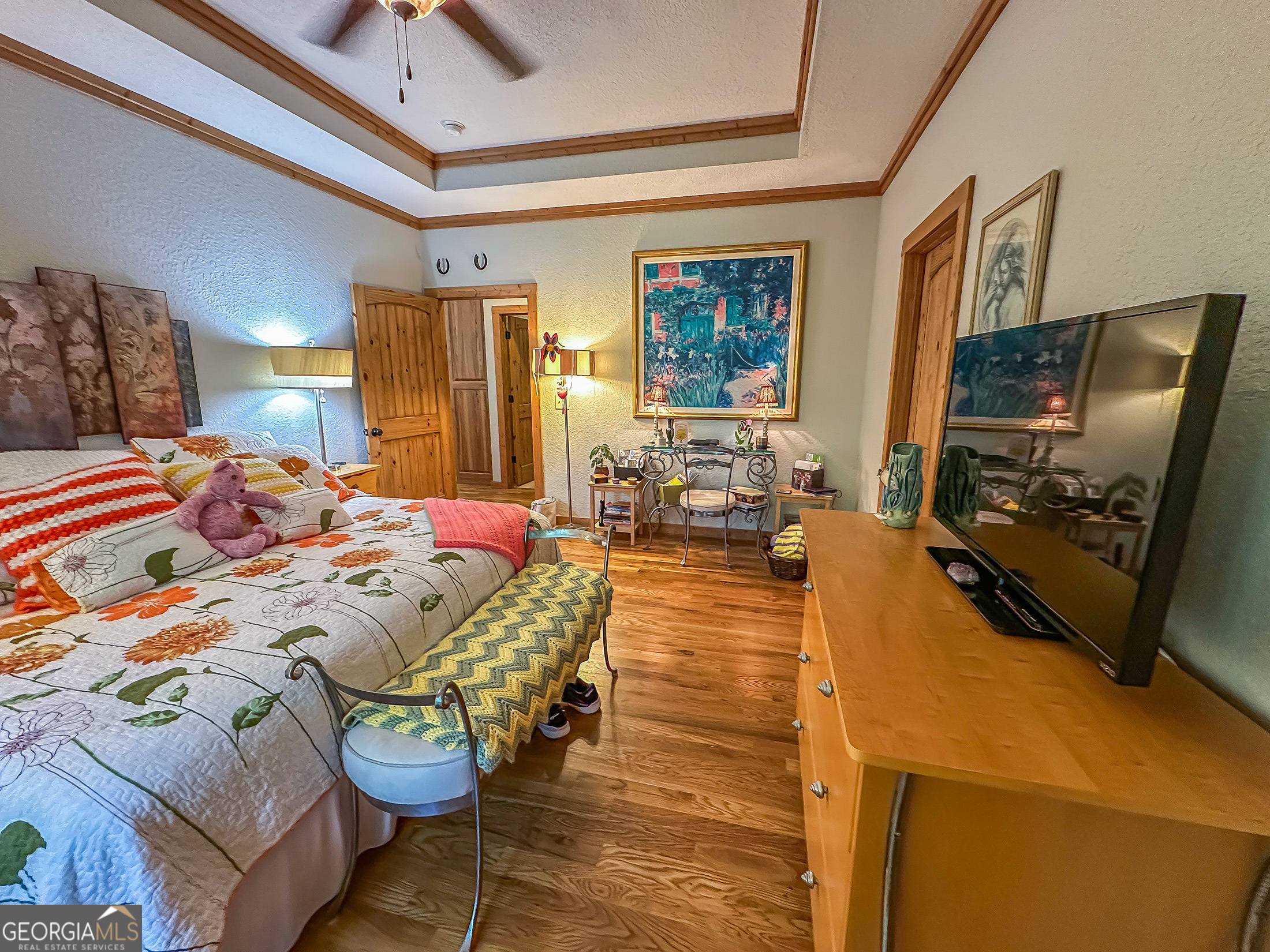 181 Morgan Ridge Court Young Harris, GA 30582 - Photo 13 of 37 a bedroom with furniture and a flat screen tv