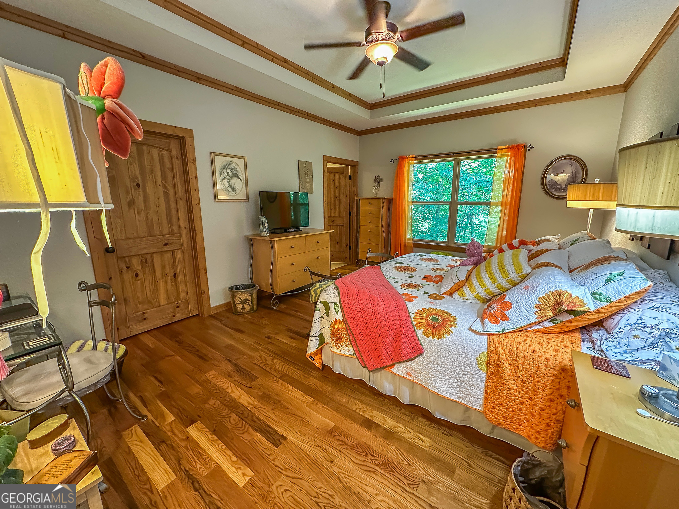 181 Morgan Ridge Court Young Harris, GA 30582 - Photo 15 of 37 a bedroom with a bed and wooden floor