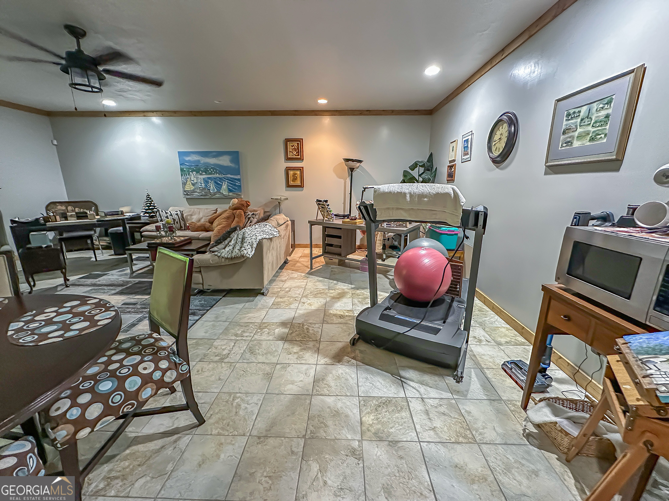 181 Morgan Ridge Court Young Harris, GA 30582 - Photo 24 of 37 a living room with furniture a rug and white walls