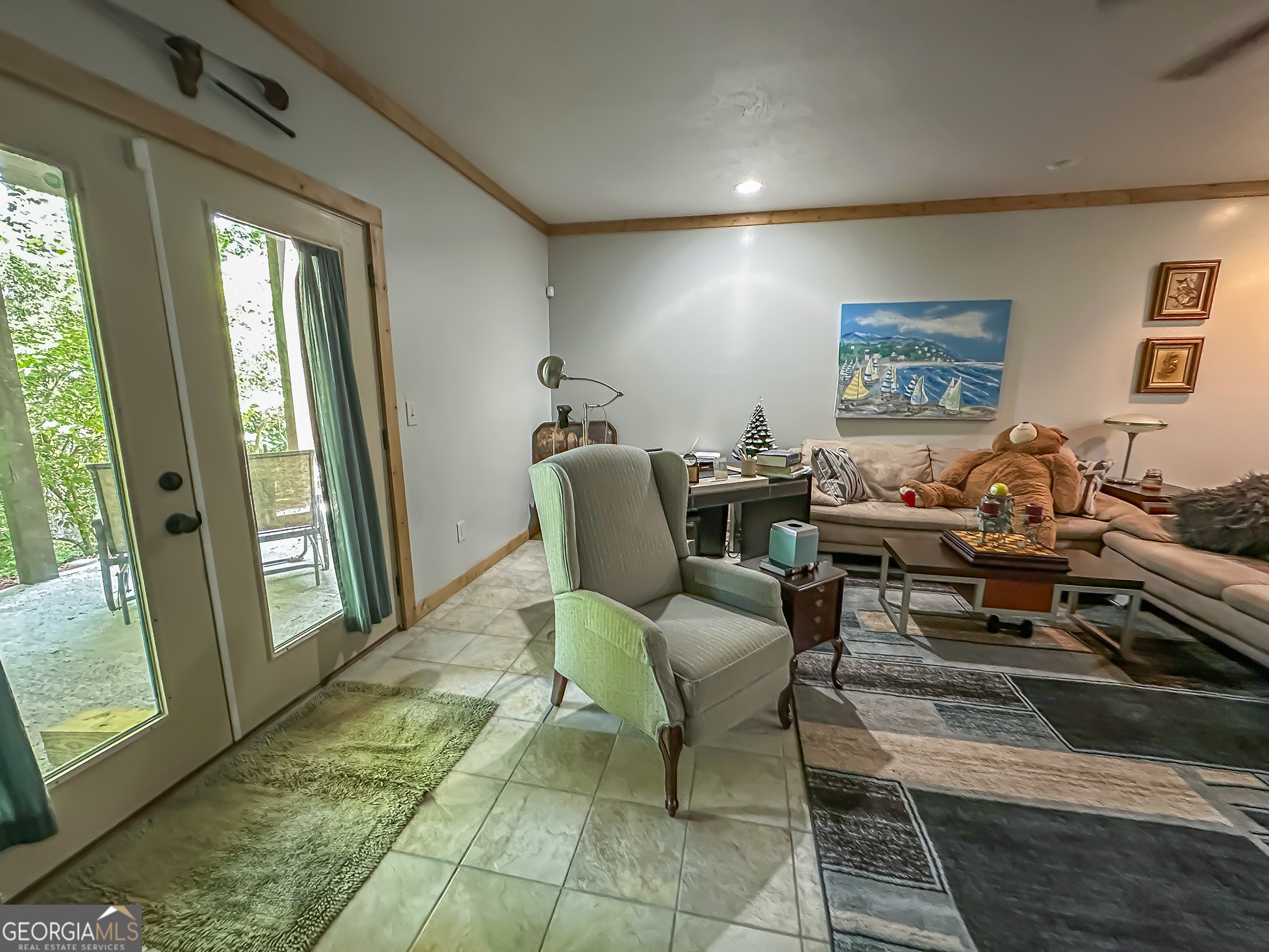 181 Morgan Ridge Court Young Harris, GA 30582 - Photo 28 of 37 a living room with lots of furniture and a rug