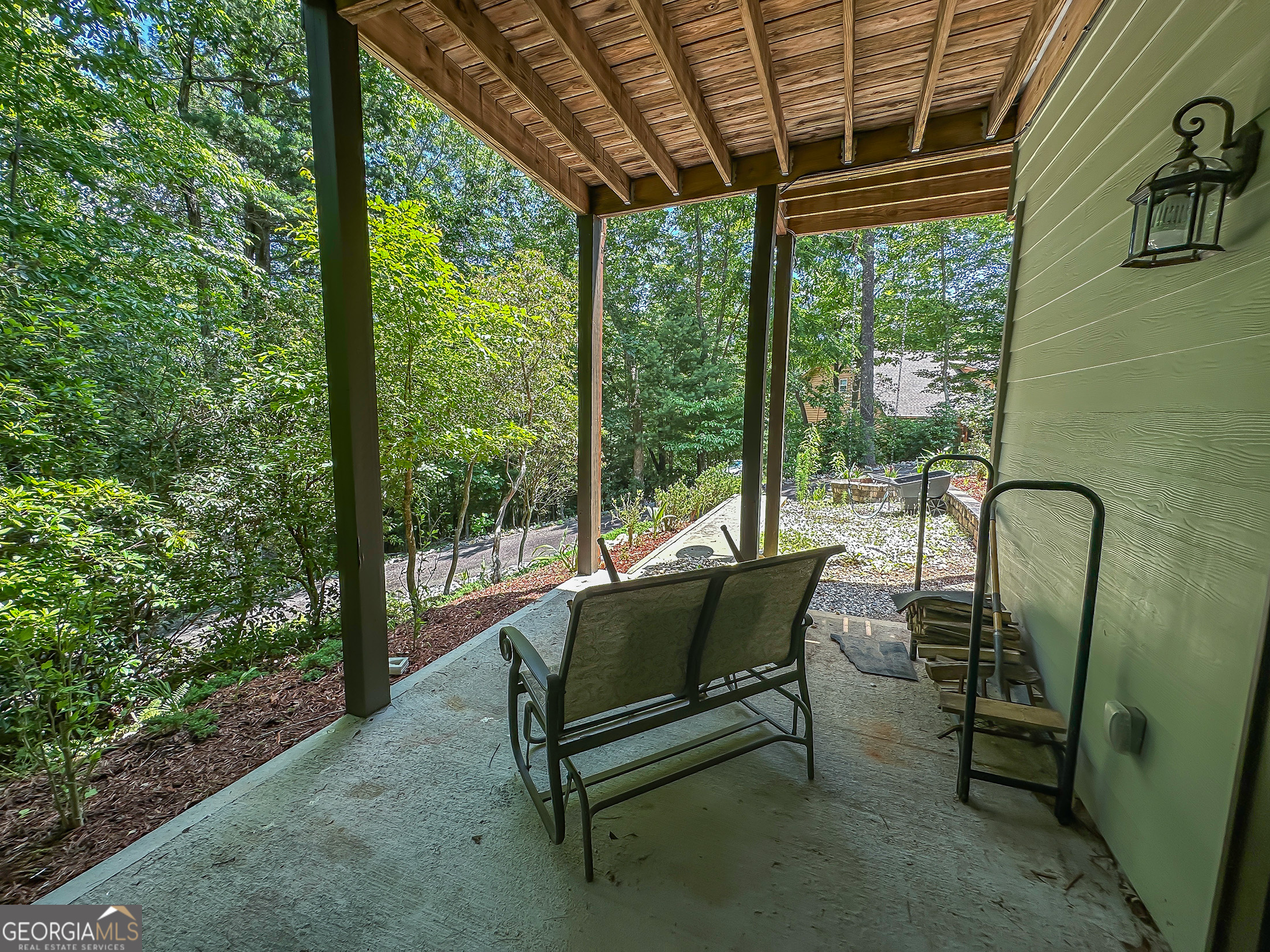 181 Morgan Ridge Court Young Harris, GA 30582 - Photo 29 of 37 a view of a chairs and table in patio next to a window