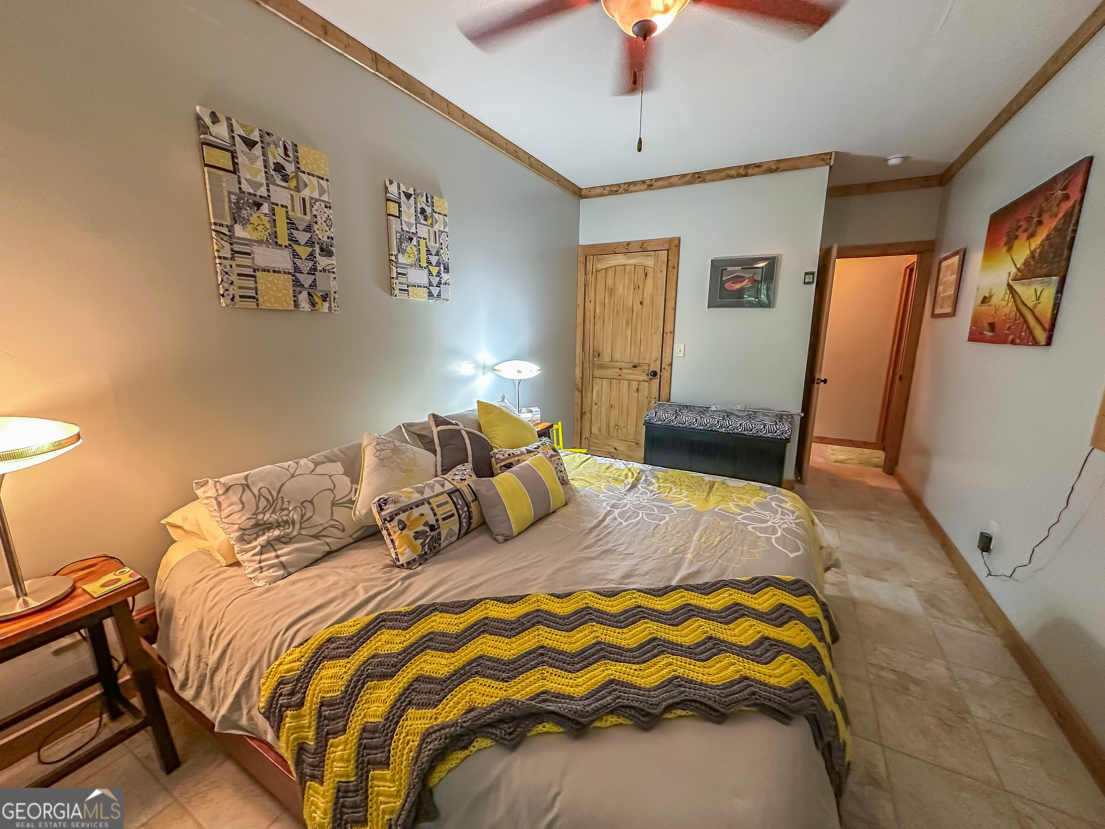 181 Morgan Ridge Court Young Harris, GA 30582 - Photo 33 of 37 a bedroom with a bed and a flat screen tv