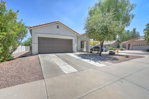 a front view of a house with yard