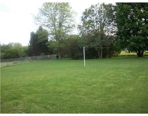 1827 Cowling Road Scottdale, PA 15683 - Photo 2 of 10 Yard/Garden. Level backyard with country views.