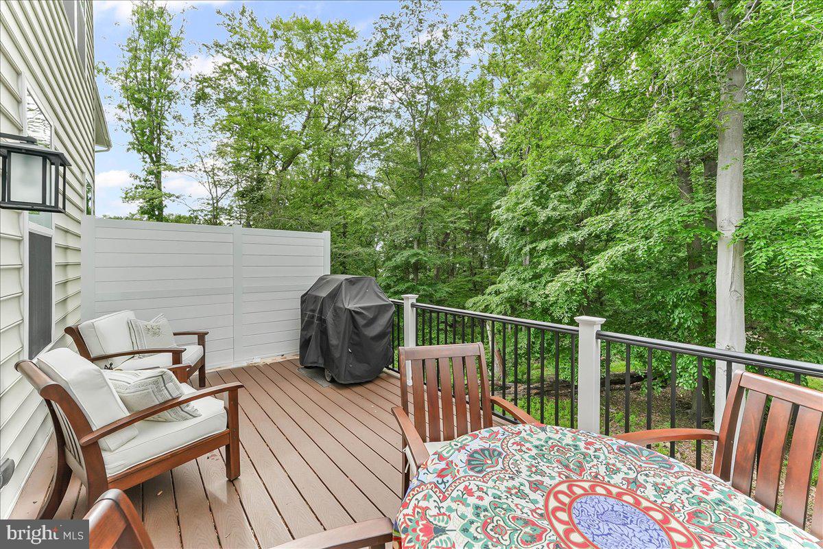 235 Ponds Edge Drive Media, PA 19063 - Photo 18 of 47 Deck with privacy screen, and woodland views