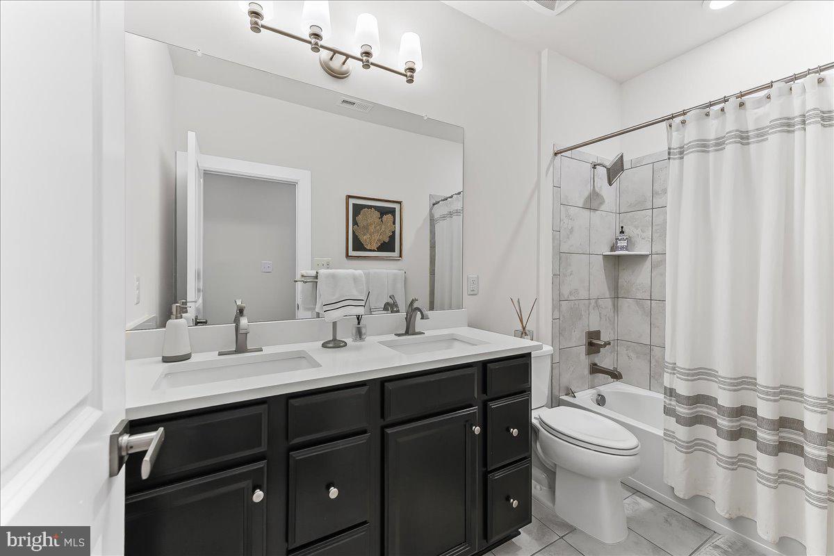 235 Ponds Edge Drive Media, PA 19063 - Photo 32 of 47 Hall Bath, double sinks, ceramic tile bath