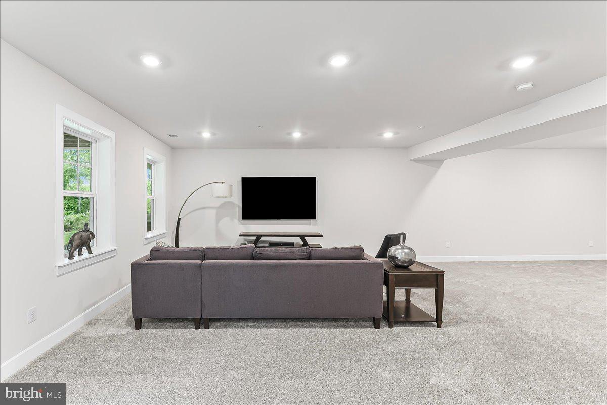 235 Ponds Edge Drive Media, PA 19063 - Photo 39 of 47 Finished Basement gathering space