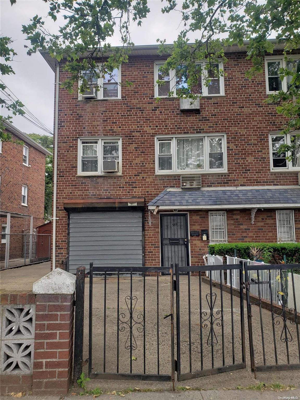 a front view of a house with glass windows